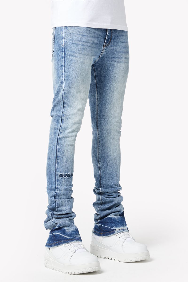 Guapi Pacific Blue Basics Stacked Denim folded neatly on a display shelf