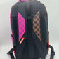 Side angle of the Sprayground Split Sip backpack displaying its 65-inch depth and practical size for everyday use
