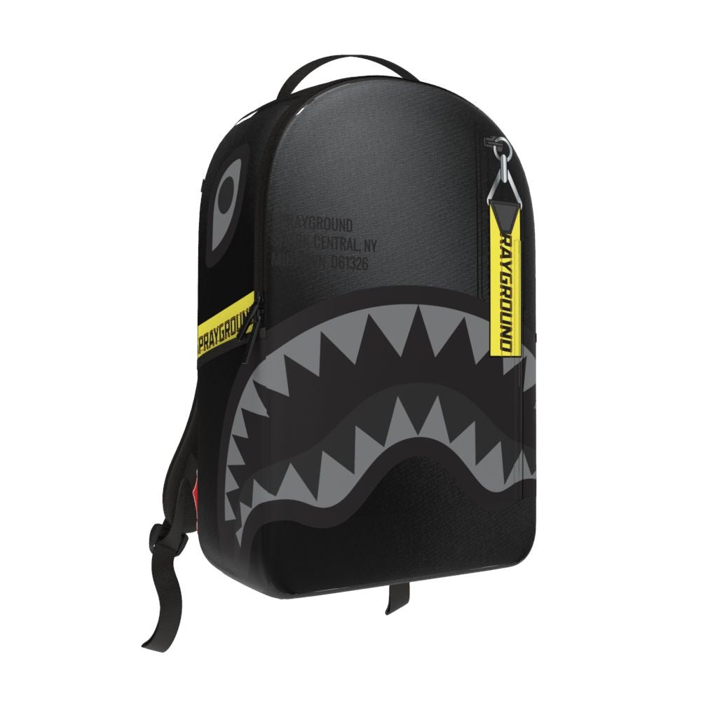 Yellow satin backpack featuring a Sprayground Shark Central design with yellow tape detailing, measuring 18 inches by 115 inches by 65 inches, made from 100% poly satin weave fabric