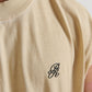 Full-length image showcasing how the PURE Monclair Horses Cream Sleeveless Tee fits on a model