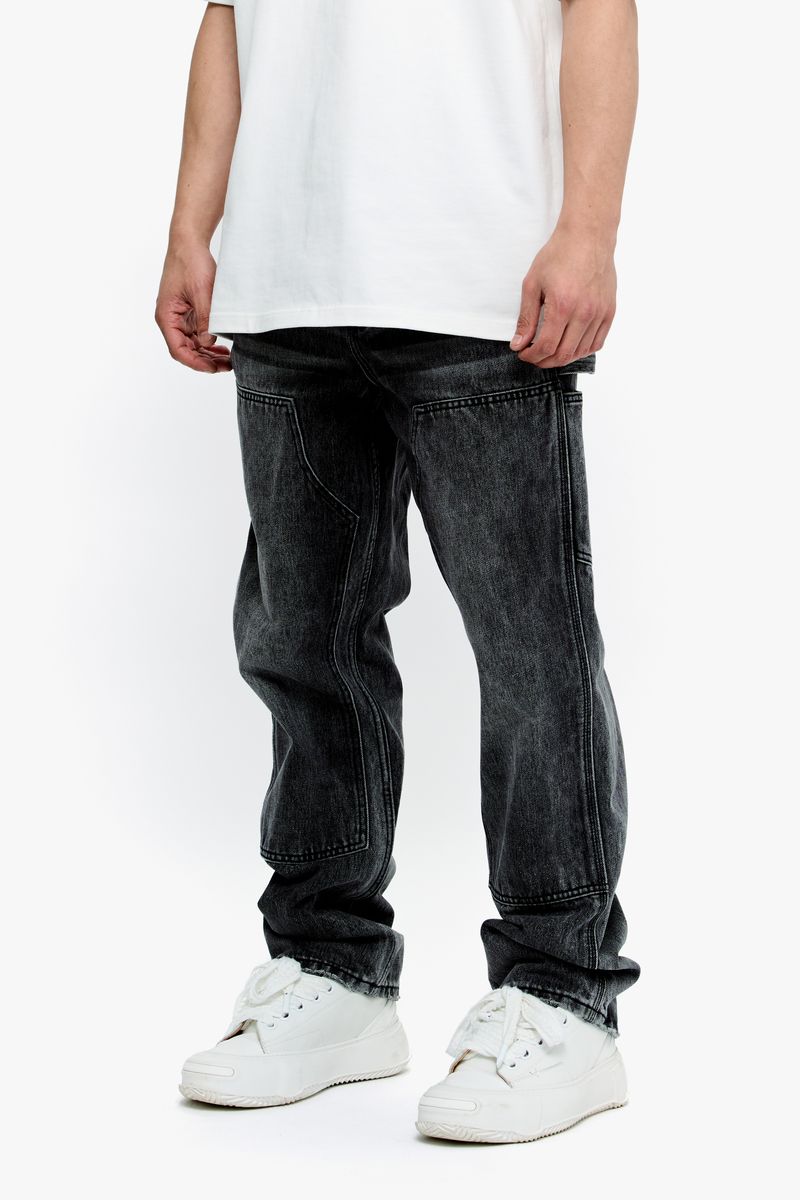 Fashionably styled person wearing Valabasas Mr Straight Grey Denim Jeans in a casual setting