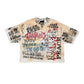 Close-up of the heavy 100% cotton Rare Peace All Over Rhinestone Ecru Tee showcasing intricate rhinestone design