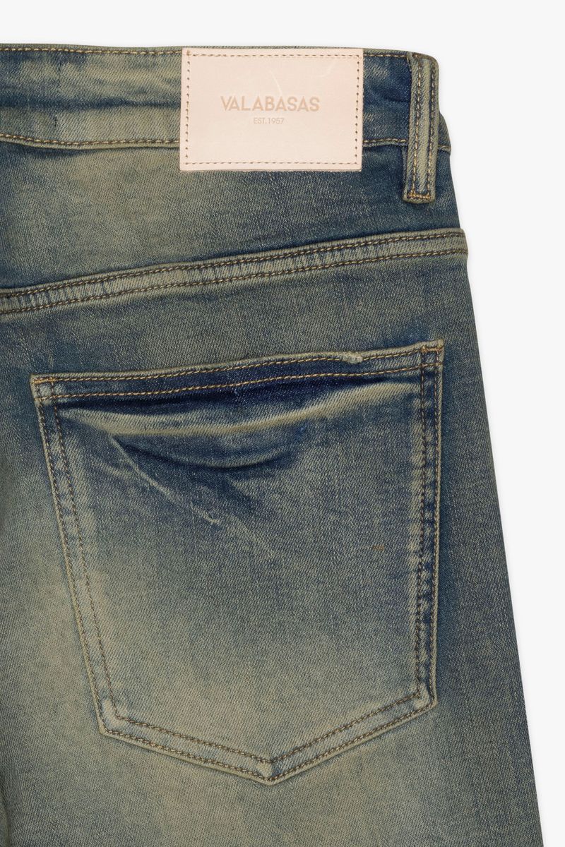 Valabasas Mr Stacked Medium Vintage Stacked Denim Jeans on model walking down the street