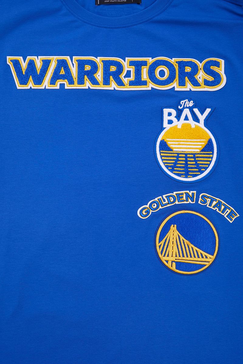 A royal blue Pro Standard Golden State Warriors men's retro classic tee featuring taping design and team logo for fans