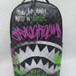 Stylish Sprayground Spray Poetry DLXV Backpack featuring vibrant design and durable PVC material