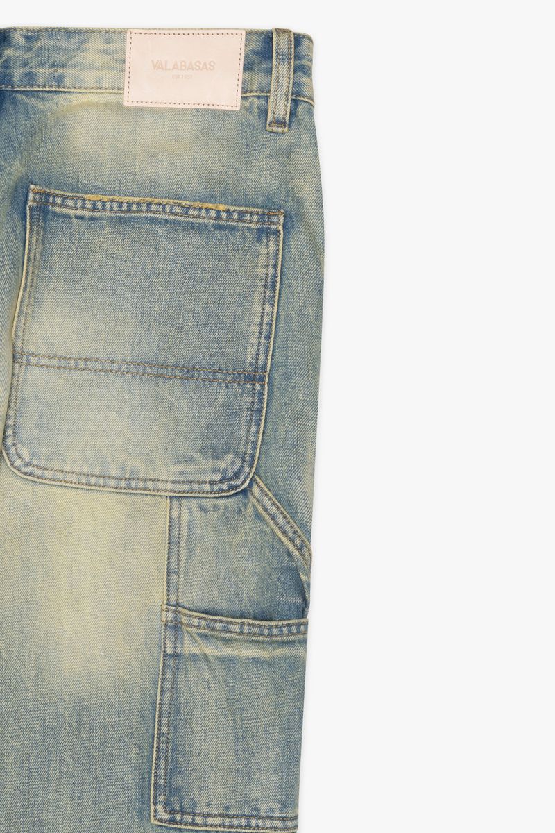 Side profile of Valabasas Mr Straight jeans showcasing the sleek silhouette and vintage wash texture