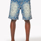 Vintage blue denim shorts with intricate embellishments and geometric patterns