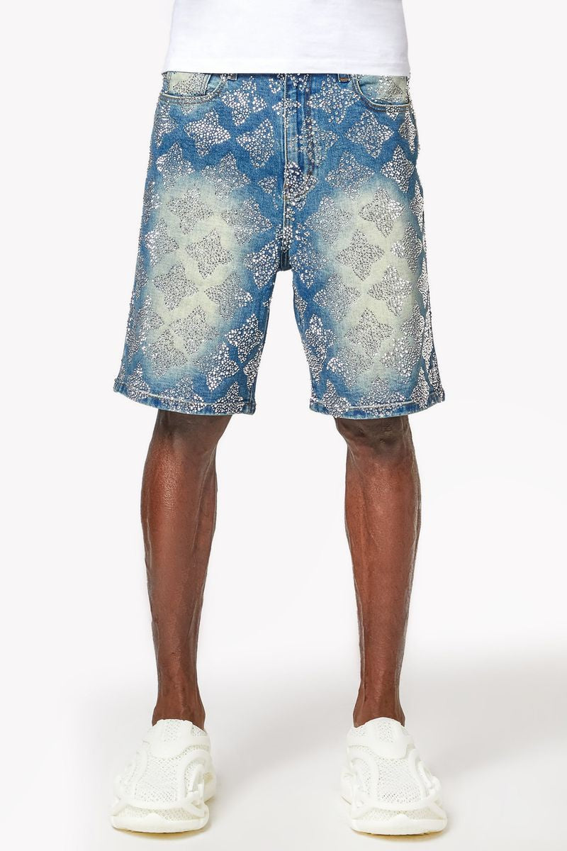 Vintage blue denim shorts with intricate embellishments and geometric patterns