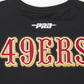 Close-up shot of the fabric texture and high-quality printing on the black 49ers City Ransom Tee