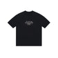 Zoomed-in view of the neckline and stitching of the PURE Monclair Black Tee emphasizing craftsmanship