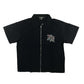 Stylish black zip-up tee featuring rhinestone embellishments spelling out ME for a bold fashion statement