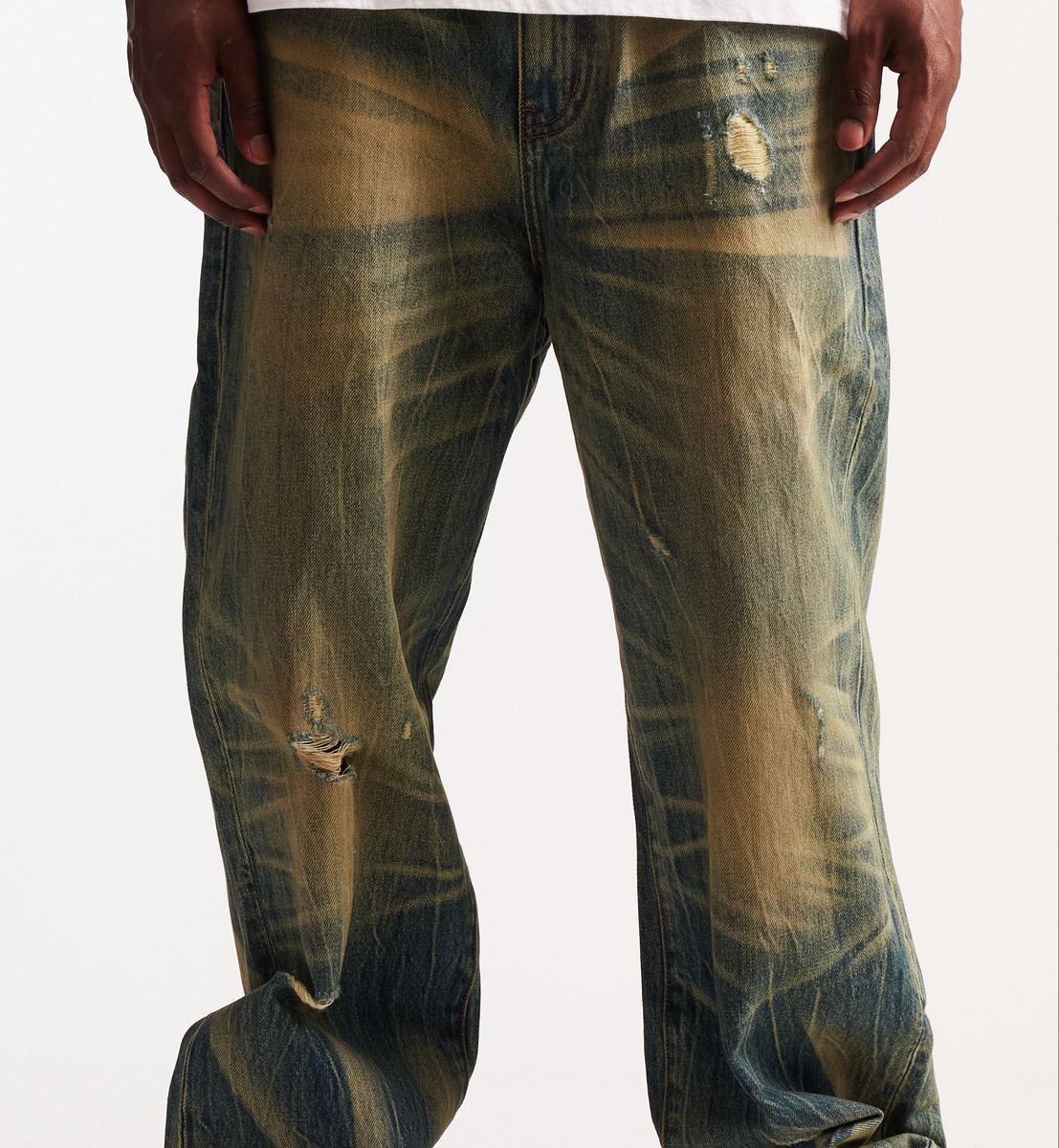 EMBSP25-124 featuring a unique acid wash pattern with fading and whiskering