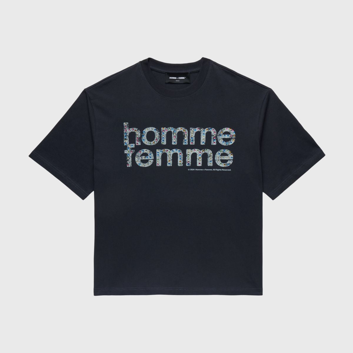 Close-up of the black Homme + Femme Mardi Gras cropped tee with screen printed text and rhinestones