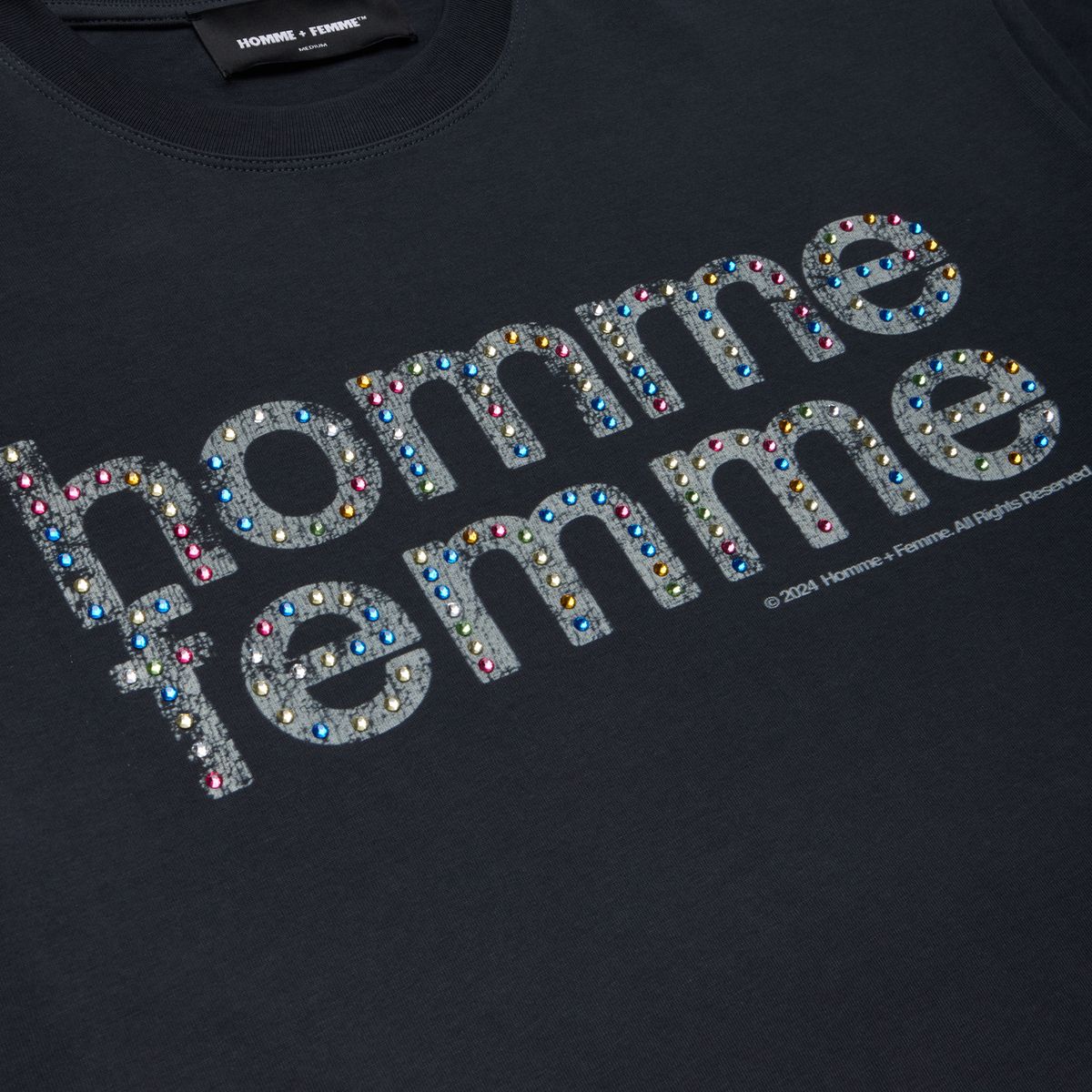 Front view of the black cropped Homme + Femme Mardi Gras tee showcasing its 100% cotton material and rhinestone embellishments