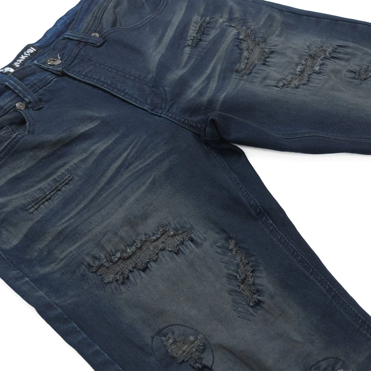 A detailed close-up image of Makobi Romano Vintage Blue Denim Jeans (M1934) showcasing classic distressed texture, stylish fit, and high-quality fabric with prominent stitching and trendy faded design