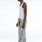 Side view of fashionable and trendy Stacked Flare Ripped Jeans by Stylo
