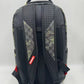Side angle of the Sprayground Camo Splash Backpack highlighting its compact 65-inch depth and high-quality PVC material construction