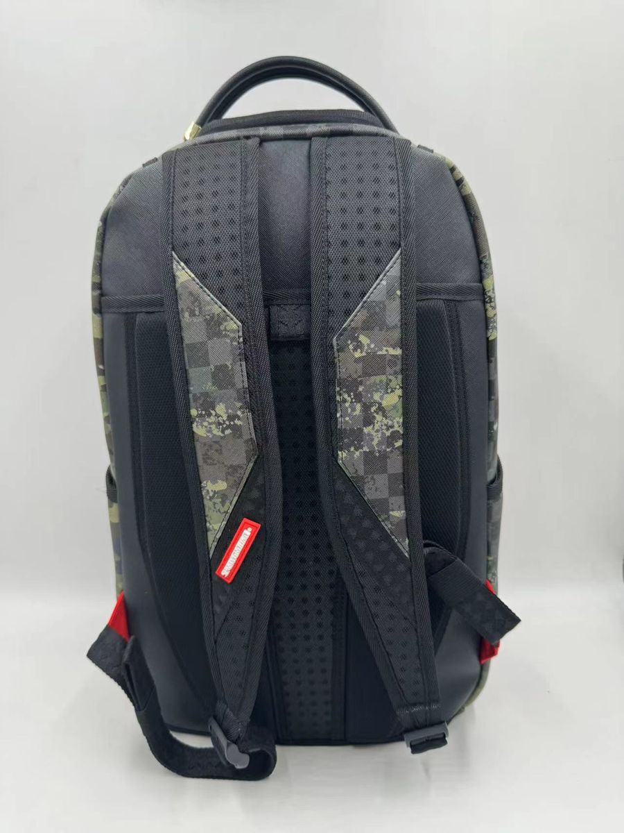 Side angle of the Sprayground Camo Splash Backpack highlighting its compact 65-inch depth and high-quality PVC material construction