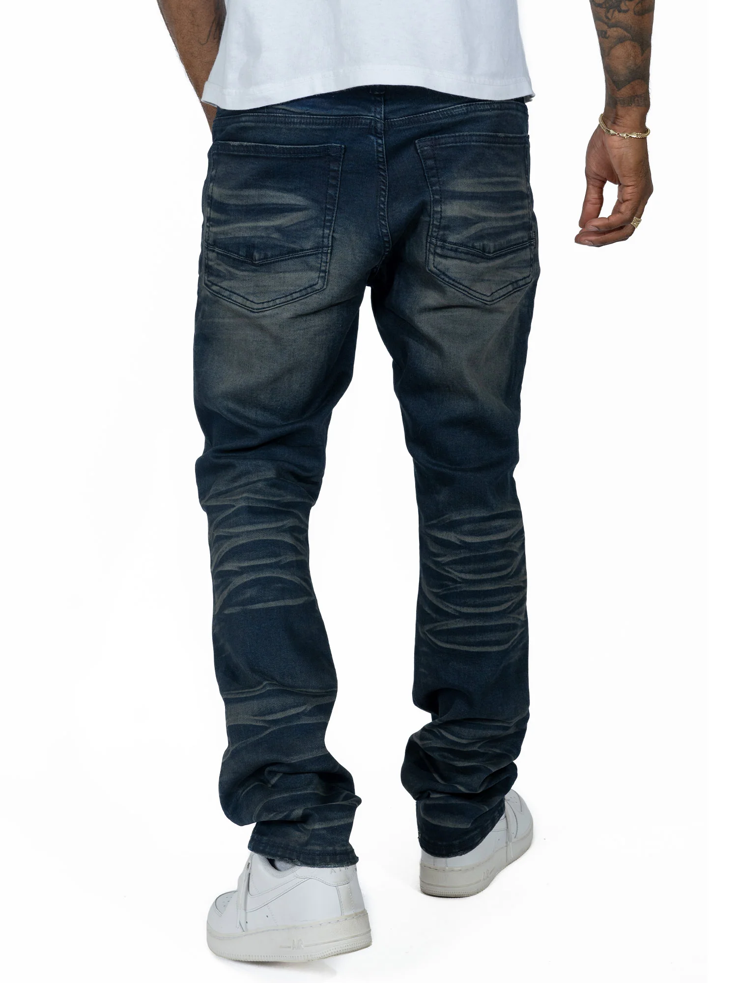 A pair of Makobi Romano Vintage Blue Denim Jeans (M1934) featuring classic distressed detailing, a high-waisted fit, and durable stitching for a timeless, stylish casual look