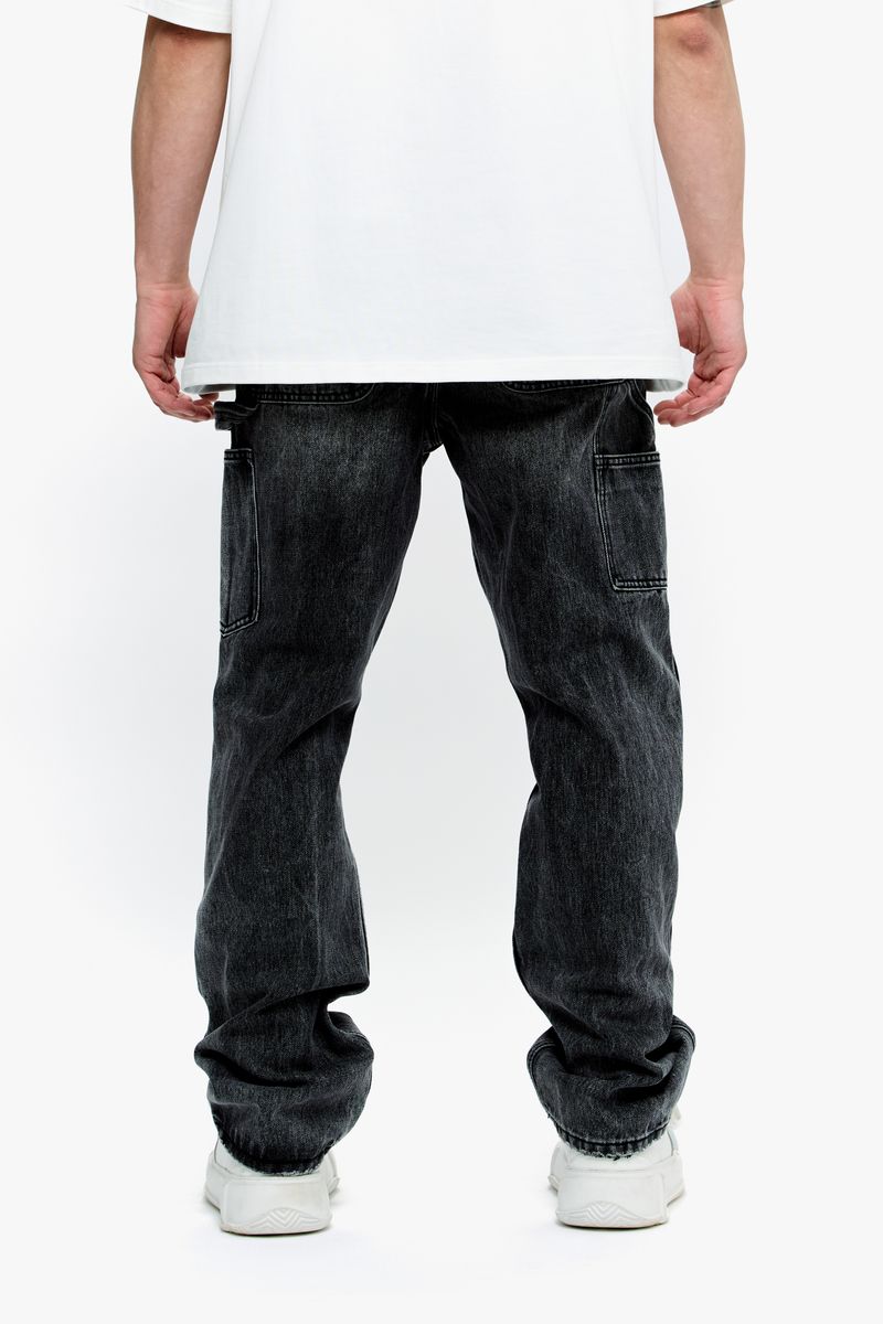 Interior view of the jeans focusing on the stitching quality and label placement