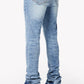 Side view of the Guapi Pacific Blue Basics Stacked Denim to show the slim fit
