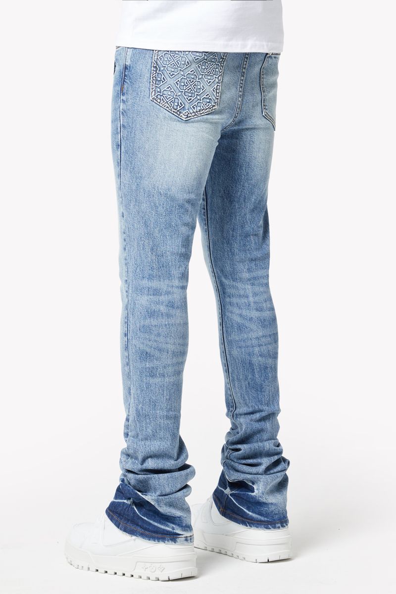 Side view of the Guapi Pacific Blue Basics Stacked Denim to show the slim fit