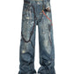 Heavyweight blue denim jeans featuring a relaxed fit and all-over graphic print