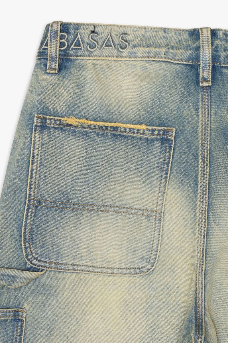 Detailed shot of the waistband and button closure of Valabasas Mr Straight vintage wash denim jeans