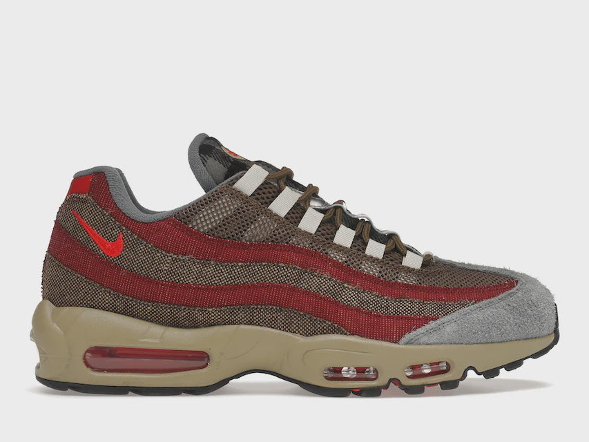 Nike Air Max 95 Freddy Krueger DC9215-200 sneaker in brown, red, and green colorway inspired by the famous horror movie character, featuring textured suede and mesh upper, iconic striped design, and visible air cushioning unit