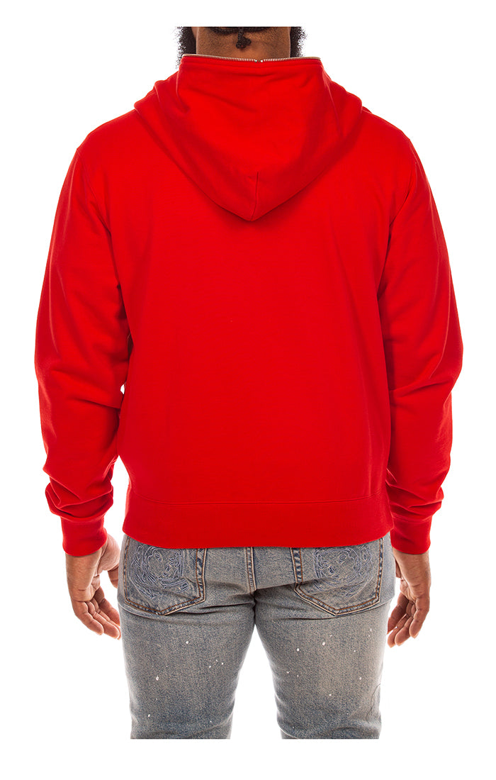 Close-up of the vibrant red BBC Red BB Curve zip-up hoodie featuring a comfortable fit and stylish branding detail
