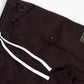 Side profile highlighting the utility pockets and straight leg design of the BBC Black Cargo Pants