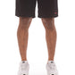 A pair of black shorts featuring the Ice Cream Running Dog design, style 451-3106, showcasing a stylish and casual clothing item