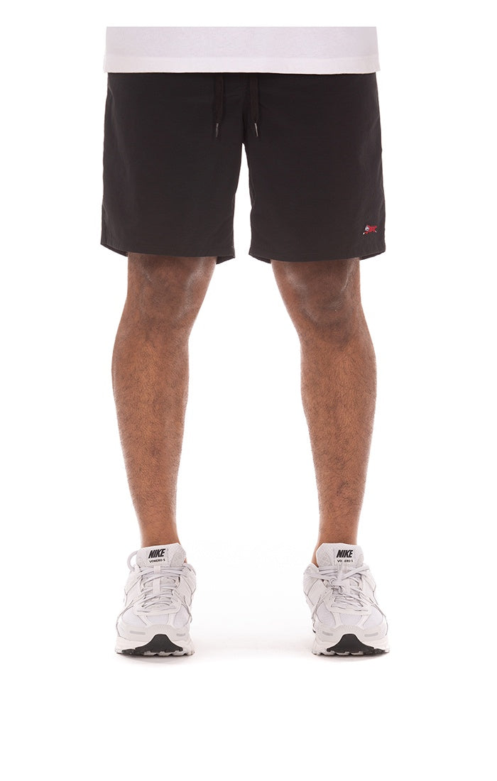 A pair of black shorts featuring the Ice Cream Running Dog design, style 451-3106, showcasing a stylish and casual clothing item