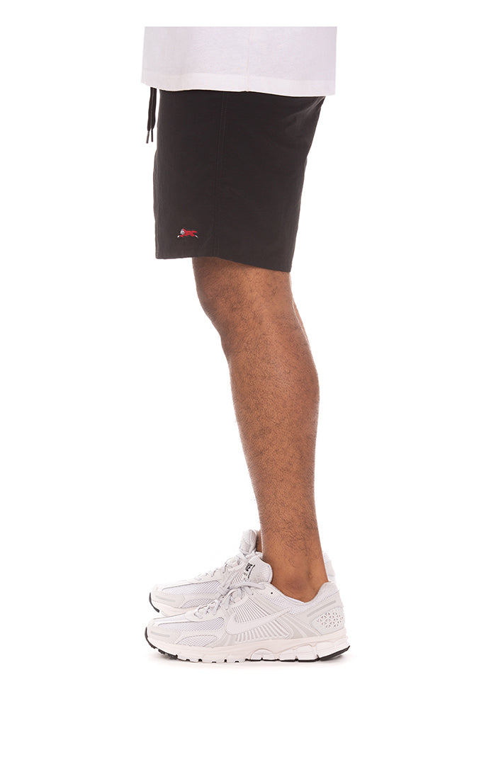 Close-up of Ice Cream Running Dog graphic on black shorts, style 451-3106 showcasing casual wear appeal
