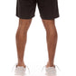 Side profile of Billionaire Boy's Club Black BB Curve Shorts highlighting relaxed fit and casual style