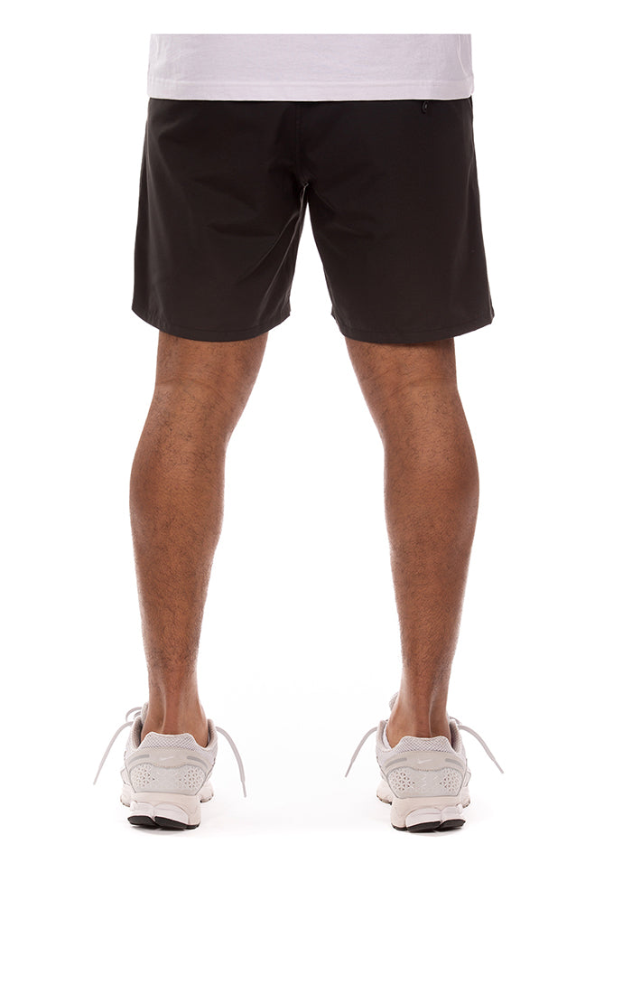 Side profile of Billionaire Boy's Club Black BB Curve Shorts highlighting relaxed fit and casual style