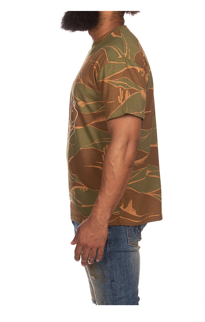 Back view of the BBC Capulet Olive BB Helmet Camo SS Tee (841-9212) t-shirt, featuring the bold BBC logo and comfortable fit for outdoor activities