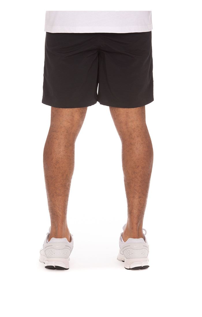 Front view of Ice Cream Running Dog black shorts style 451-3106 highlighting modern athletic design