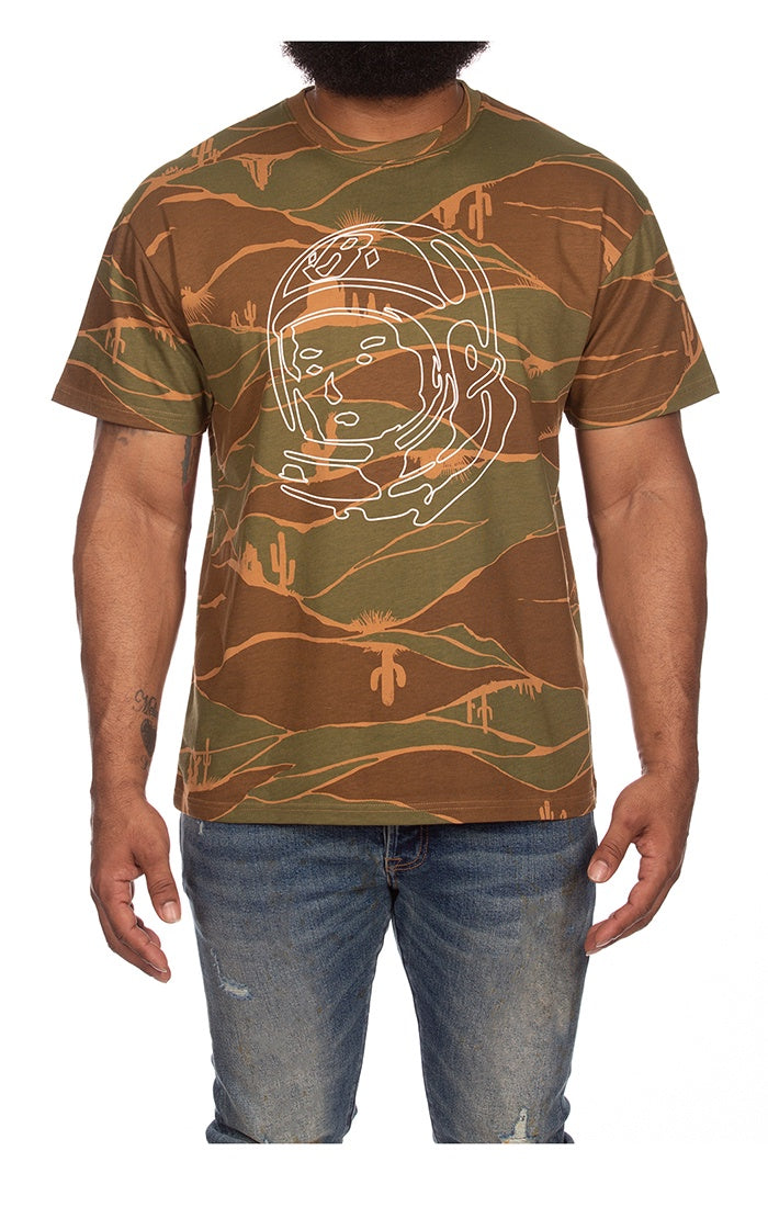 BBC Capulet Olive BB Helmet Camo SS Tee (841-9212) t-shirt displayed on a mannequin in a natural outdoor setting, showcasing its camo design and comfortable fit