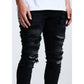 Embellish Oden Ripped Black Denim Jeans in urban street setting