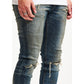 Embellish Shade Indigo Rinse Denim Jeans with distressed details and faded wash