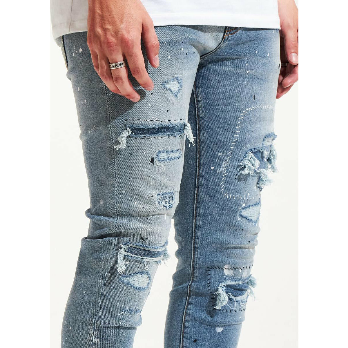 Crysp Denim Blue Arctic Jeans featuring Unique Tear Accents