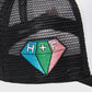 Unisex Beverly Hills trucker hat in black and white with a prominent patch and multi-colored diamond accent on the right panel