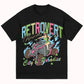 Retrovert Paradise Black Tee, a classic black t-shirt with vintage-inspired graphic print of a tropical paradise, perfect for casual and laid-back style
