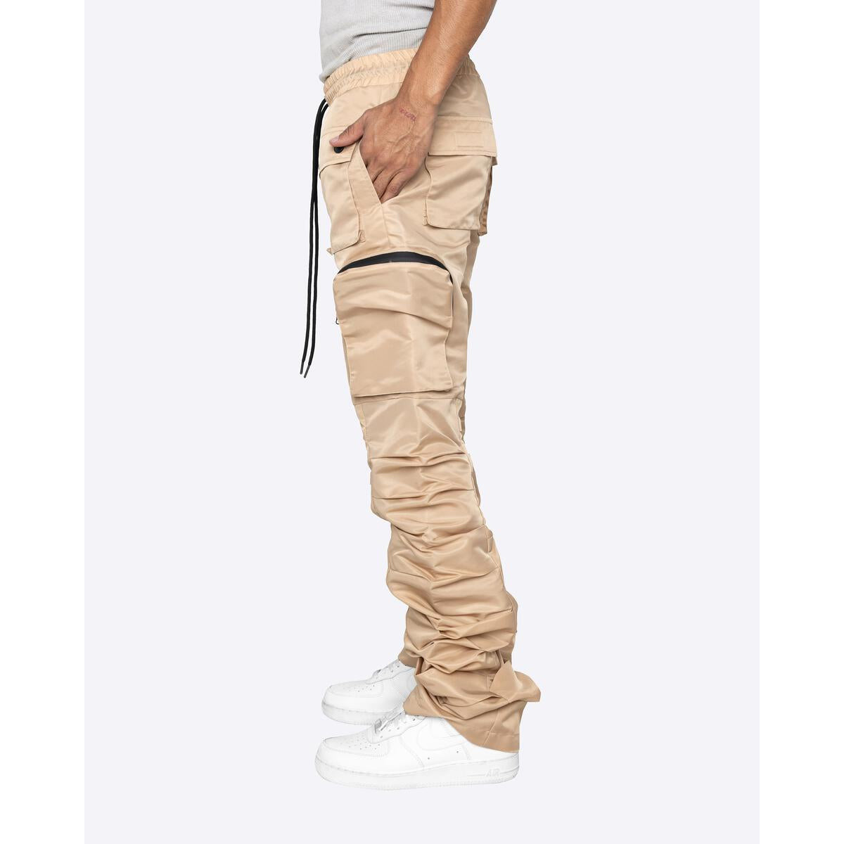 Side view of the EPTM Stacked Flare 30 Track Pants in Khaki, highlighting the unique flare design and modern aesthetic