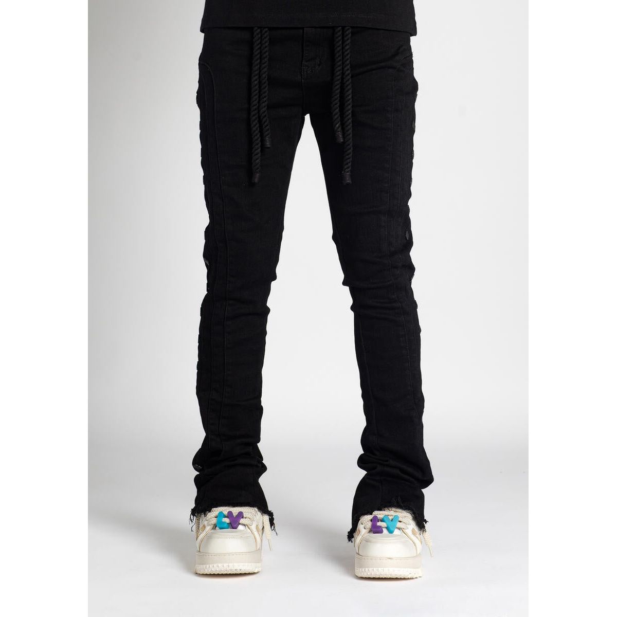 Guapi All Black Layer Stacked Denim with distressed detailing and slim fit