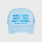 Baby blue classic trucker hat with Fake Love embroidery at front
