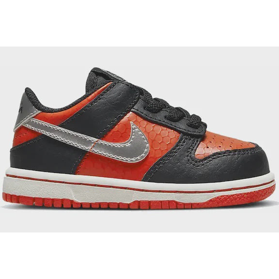 A pair of Nike Dunk Low SE - Martian (TD) (DV1987-001) sneakers, featuring a black and green colorway with Martian-themed details, on a white background