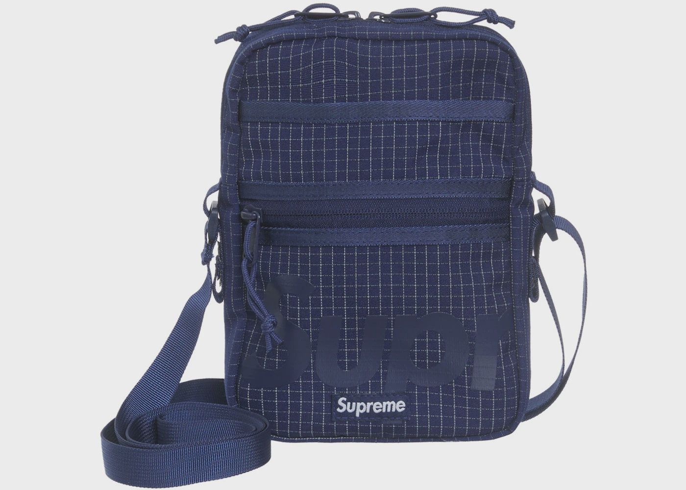 Stylish and versatile Supreme Shoulder Bag in Navy (SS24) with adjustable strap and multiple pockets