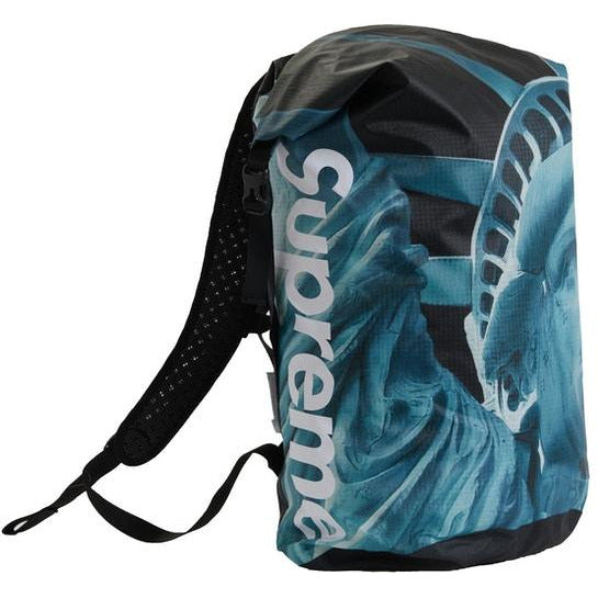 High-quality Supreme The North Face Statue of Liberty Waterproof Backpack - Black featuring a spacious main compartment and top handle for easy carrying